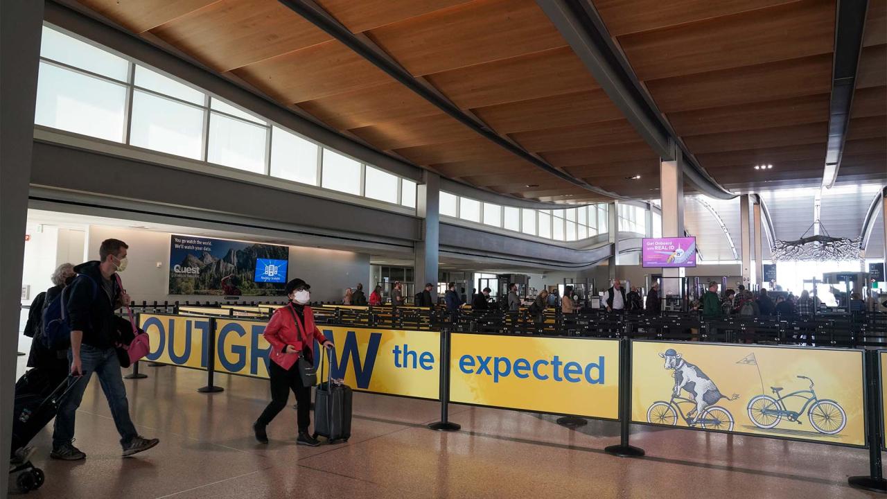 Outgrow the Expected ads on airport walls