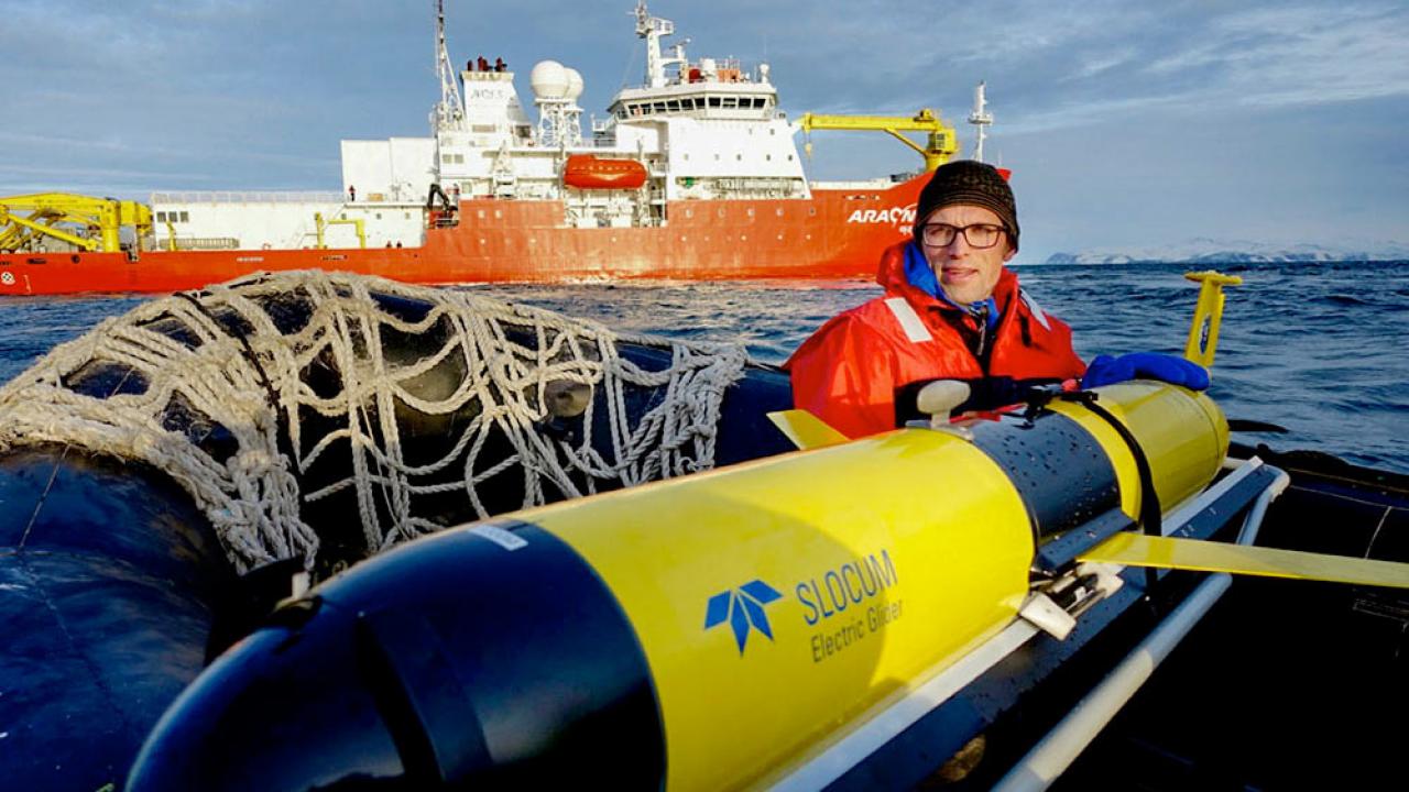 A UC Davis researcher maintains a small submersible that is designed to collect ocean temperature data