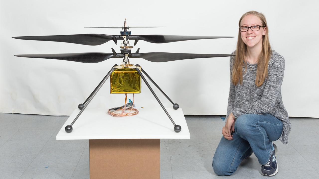 Sara Langberg with Ingenuity helicopter.