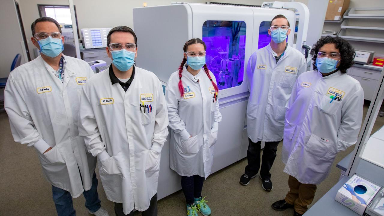 UC Davis Health Molecular Pathology team, masked, in lab