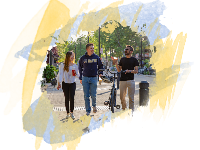 Three student walking together on campus overlayed on top of a blue and yellow watercolor brushstroke background