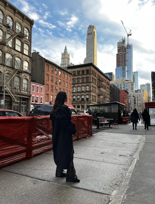 Isabella Verduzco staring at the New York skyline.