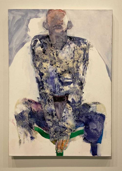 Jennifer Packer's painting depicts a faceless man with his body made up of a black, blue, and yellow watercolor texture.