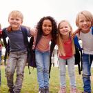 Smiling children in a line
