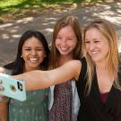 Three female college students taking a selfie