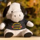 Cuddle cow, stuffed animal, wearing T-shirt that reads: "Someone at UC Davis Loves Me."