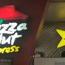 Pizza Hut and Carl's Jr. signs in Silo