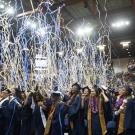 Streamers fall above graduates