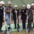 Warren and Leta Giedt, third and fourth from the left, respectively, break ground on Giedt Hall, a classroom building slated to open in 2007. Chancellor Larry Vanderhoef, far right, lends a helping hand along with engineering college Dean Enriqu