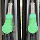 Two gas hoses with green handles