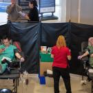 Two donors, 6 feet apart, at blood drive