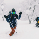 Brita Sigourney in North Face uniform, in snow in Japan, pre-Olympics