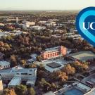 Aerial photo of UC Davis campus with blue heart icon overlaid.