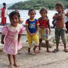 These children's parents left their island state of Tuvalu because of rising sea levels. Now they live on the Fijian island of Kioa, hundreds of miles away. They receive daily deliveries of food and household supplies by boat.