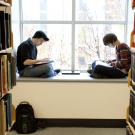 Photo: Two students in Shields Library
