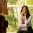 female student sitting in library