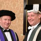 Two men in academic regalia