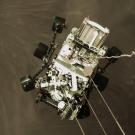 Perseverance rover is lowered to surface of Mars, in image that shows rigging from "sky crane."