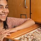 Photo: Natalia Lopez Carranza displays the fossils she is studying