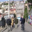 The UC Davis delegation tours the Open Sky Museum in Valparaiso, Chile, led by museum curator Paola Pascual Concha, center in tan coat. Other delegates are, from left, are Rosalie Vanderhoef, Bill Lacy, Bob Kerr, Tu Jarvis and Chancellor Larry V