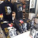 A photo of Star Wars shirts in the bookstore.