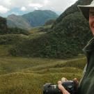 Alexander Harcourt, camera in hand, in the Ecuadorian highlands