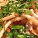 French fries covered in Thai hot peppers