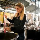 Woman scientist conducts tests in winery laboratory