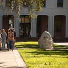 Prospective students and their parents take a walking tour of campus on February 7, 2022. The tour visits an Egghead outside Mrak Hall.