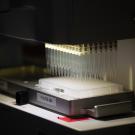 Tiny vials are suspended in an Intelliqube machine