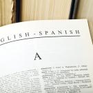 A photo of an English-to-Spanish dictionary page