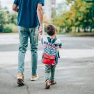 Child and adult walking