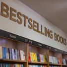 books on shelves with title "best-selling books"