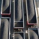 aerial view of trains full of coal in open air