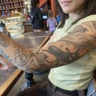 Mia Lippey's tattooed arm