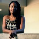 Tiana Williams leans on a concrete divider at UC Davis.