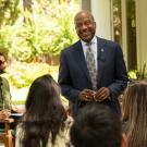 Chancellor Gary S. May addresses "Thursday Thoughts" audience, outdoors