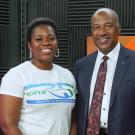 Uyi Effiom and Chancellor Gary S. May pose for a photo in the video studio for Face to Face With Chancellor May.