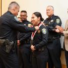 Police Chief Joe Farrow awards medal to police officer