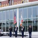 Army ROTC color guard under "Memorial Union" sign