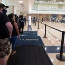 Students wait in line inside the ARC to get COVID-19 tests.