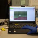 COVID-19 testing program: data on laptop monitor
