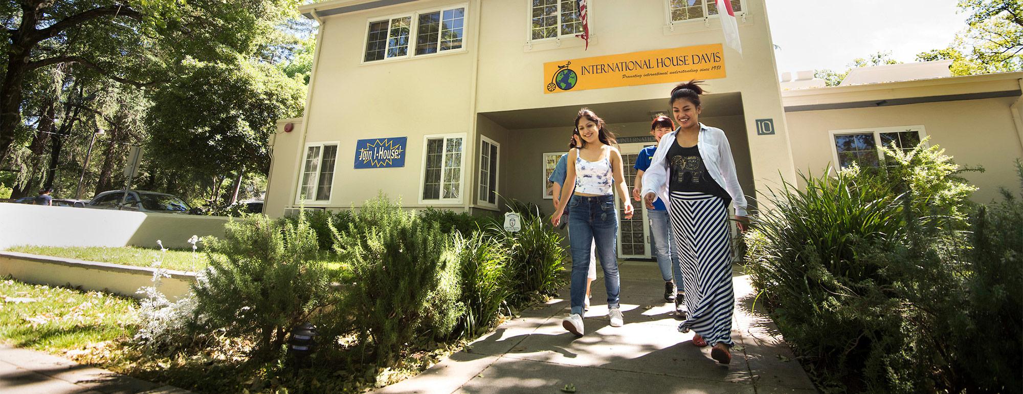 three students leaving the International House at UC Davis