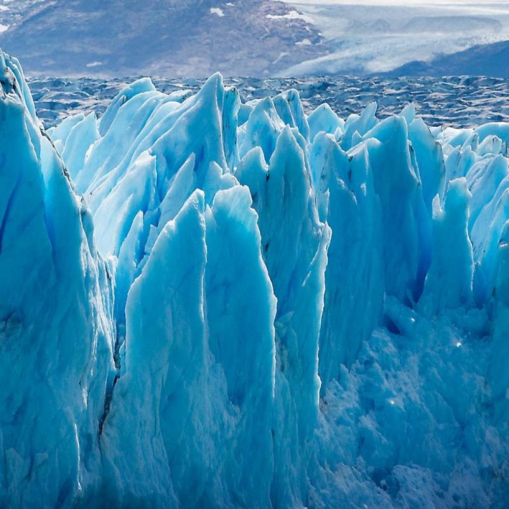 A blue calving glacier