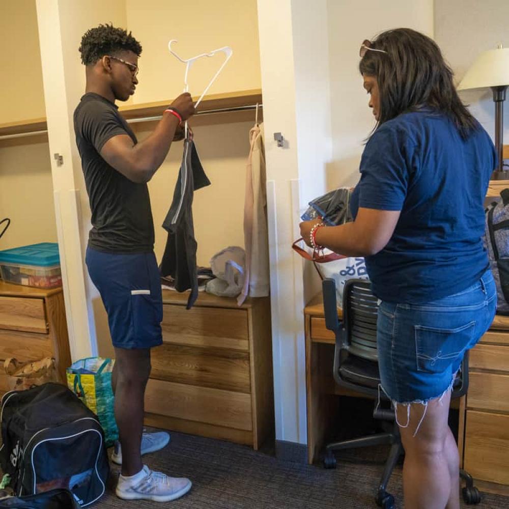 student and parent setting up room in residence halls - housing at UC Davis