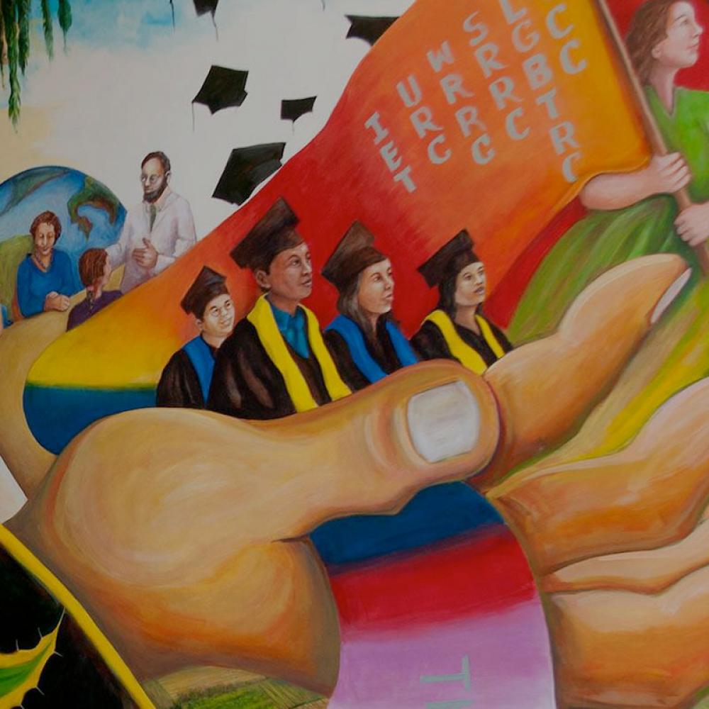 A detail of a mural showing several students of different ethnicities in grad robes