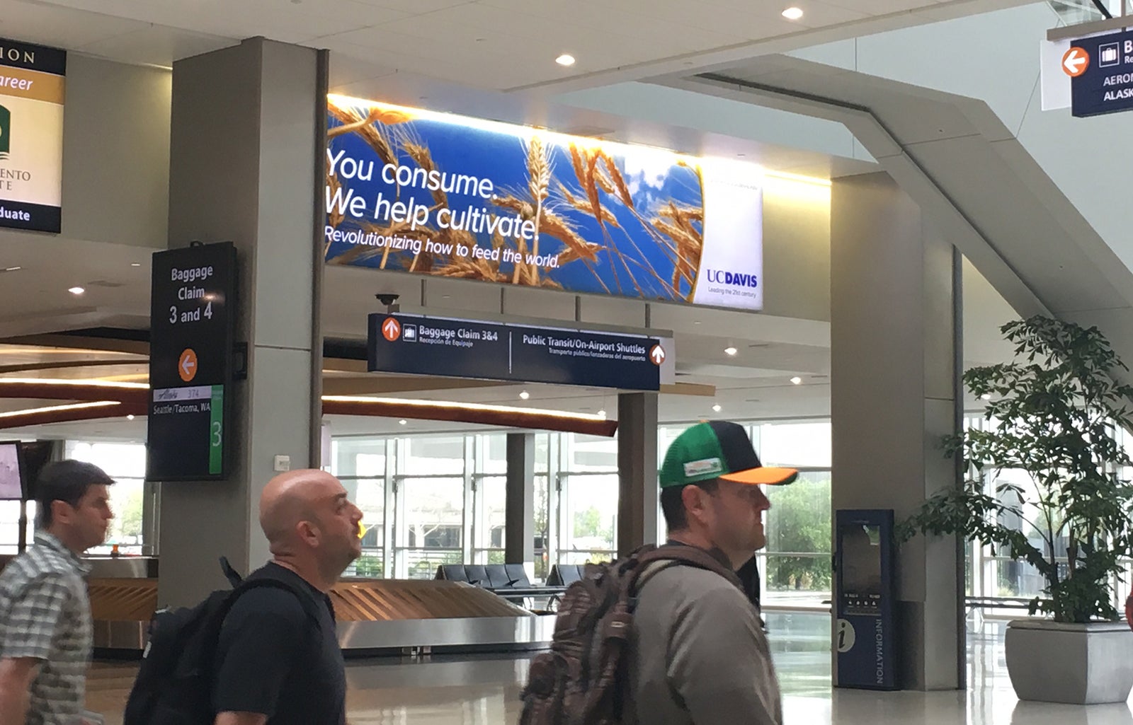 A UC Davis ad hangs in Sacramento International Airport.