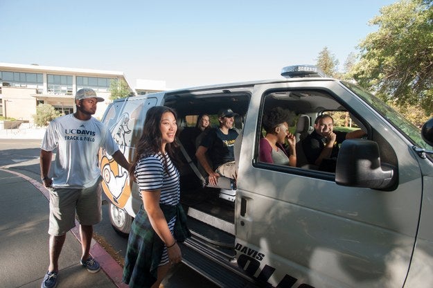 Students boarding a safe rides van