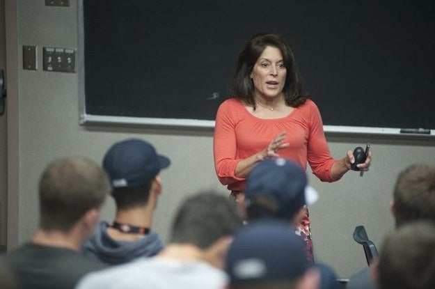Professor Liz Applegate lecturing in front of a classroom of students
