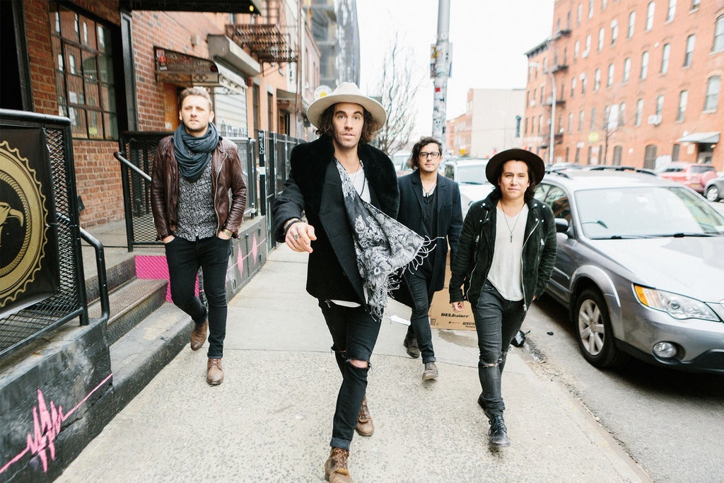 The four members of American Authors walking down a street in New York City.